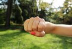 fist of a girl - what to do when child hits at school