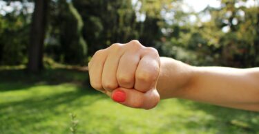 fist of a girl - what to do when child hits at school