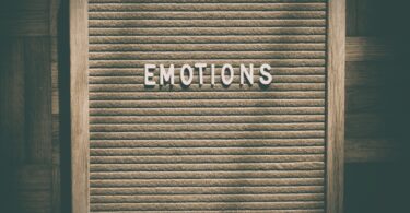 letter board with the word emotions